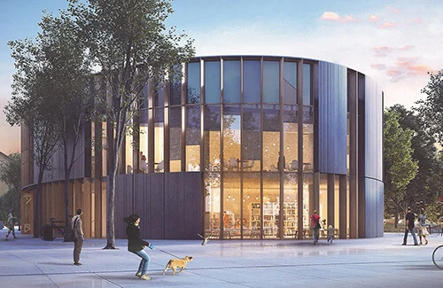 Eliptyczny budynek biblioteki w Szczecinie o zmierzchu — przeszklona fasada w drewnianych słupkach z widoczną częścią czytelni w środku, przechodnie z psem na placu przed wejściem.