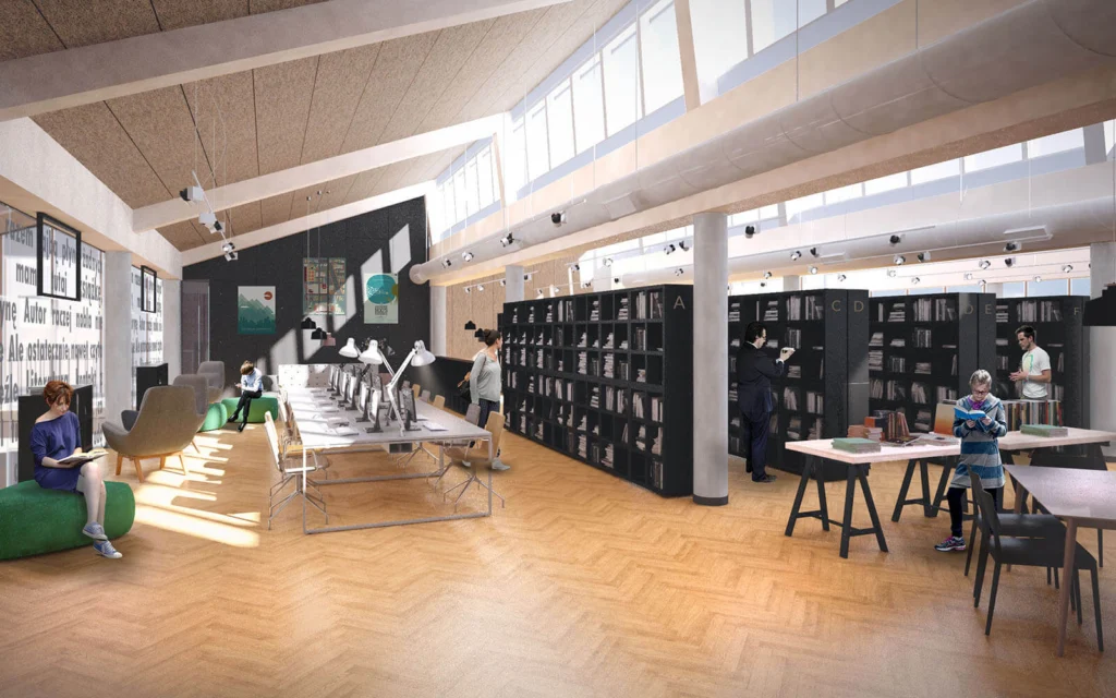 Wnętrze czytelni biblioteki — ciemne regały z książkami, drewniana podłoga w jodełkę, długi stół ze stanowiskami do pracy pod lampkami i czytelnicy siedzący na miękkich pufach.