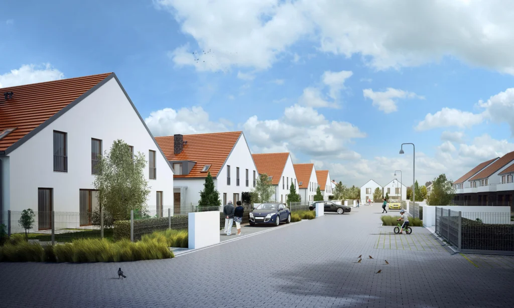 Panoramiczny widok ciągu pieszo-jezdnego osiedla z perspektywy ulicy — rząd białych domów o dwuspadowych czerwonych dachach, latarnie, ptaki na kostce brukowej i chłopiec na rowerku.